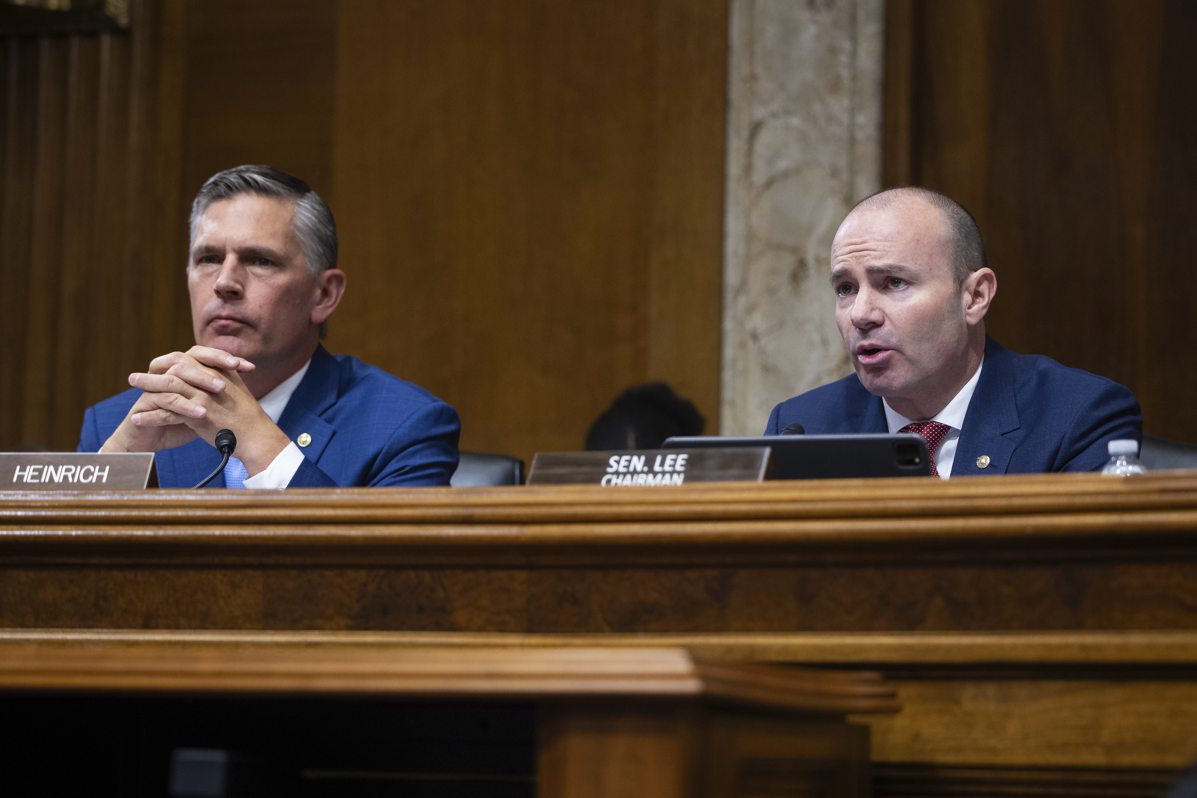 Senate Energy and Natural Resources ranking member Martin Heinrich (D-N.M.) and Chair Mike Lee (R-Utah) preside over a confirmation hearing.
